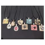 Ten picture charm necklaces