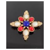 Gold tone red, white, & blue Sarahcov brooche