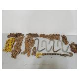 Crate of assorted tow chains and hooks