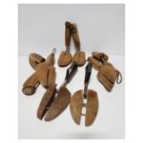 Four pairs of wood shoe trees