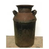 Large metal milk jug