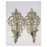Pair of ornate metal wall sconces