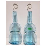 Blue glass violin shaped bottles