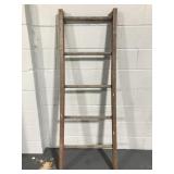 Rustic weathered red ladder