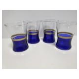 Gold and blue painted drinking glasses