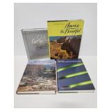 Four hardcover coffee table books