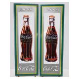Two metal Coca Cola reproduction signs