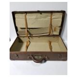 Vintage brown leather suitcase