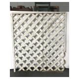Old weathered white garden lattice section