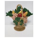 Vintage cast iron fruit basket door stop