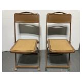 Two Vintage metal folding chairs