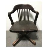 Vintage wood rolling desk chair