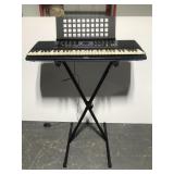 Yamaha PSR-190 keyboard on stand