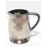 Wallace hard soldered stamped mini pitcher