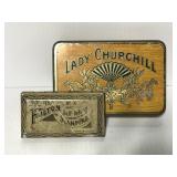 Two small vintage tins