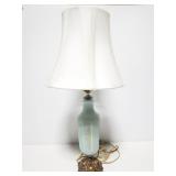 Vintage glass lamp with ornate metal vase