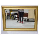 Large gold framed mirror