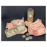 Tin coin bank w/ Trinidad & Tobago money