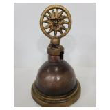 Decorative cast metal piece with sun accent