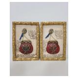 Two resin wall art plaques