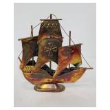 Small metal ship sculpture
