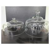 Two glass cake domes