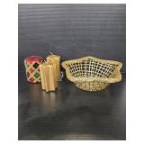 Three unused candles, votive, and metal basket