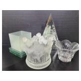 Four glass candle votives