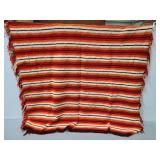 Orange stripped pattern crocheted blanket
