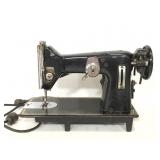 Vintage heavy black sewing machine