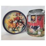 Two large metal tins