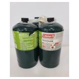 Three Coleman camping gas fuel canisters