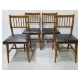Four vintage MCM dinning chairs