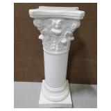 White chalkware pillar