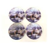 Four matching signed Ambiance coasters
