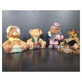 Four vintage resin bears