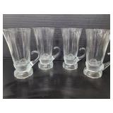 Four vintage glass cups with handles