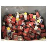 Tote of assorted 2 cycle motor lubricants