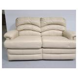 Cream leather reclining love seat