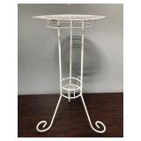 Small metal plant stand with mesh top