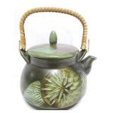 Asian style green ceramic teapot
