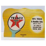 Texaco ad with sewing needles