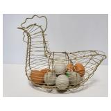Wire hen with stone eggs