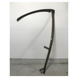 Old primitive farm scythe sickle tool