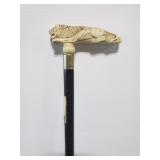 Carved handle cane