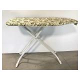 Sturdy folding metal ironing board with cover