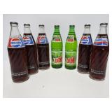 Unopened vintage Pepsi and Mountain dew bottles