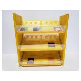 Yellow M&M candy display shelf