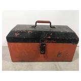 Old red and black steel metal toolbox