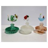 Small perfume bottles with art glass stoppers